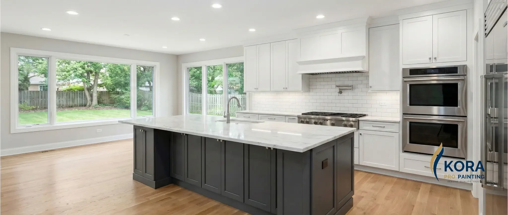 Interior painting services in Buffalo Grove IL showing a luxury modern living room and kitchen renovation.