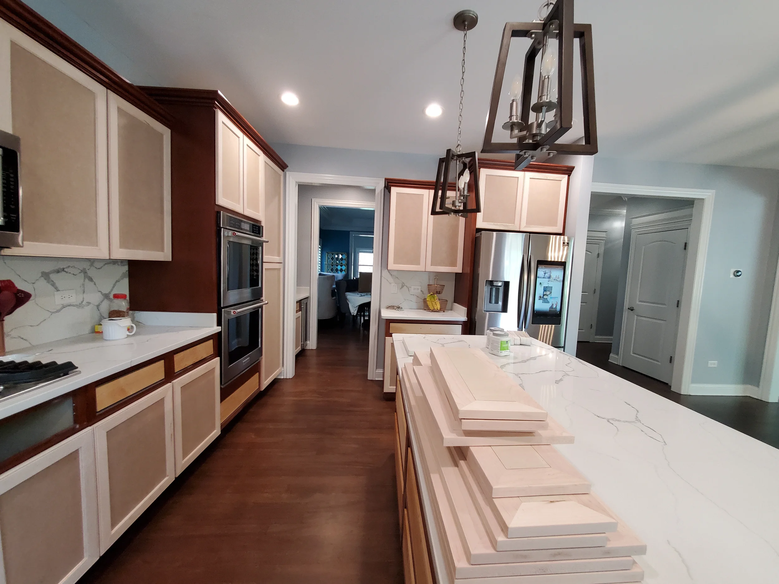 Dated kitchen cabinets in a Hinsdale home before a professional factory-finish transformation by Kora Pro Painting.