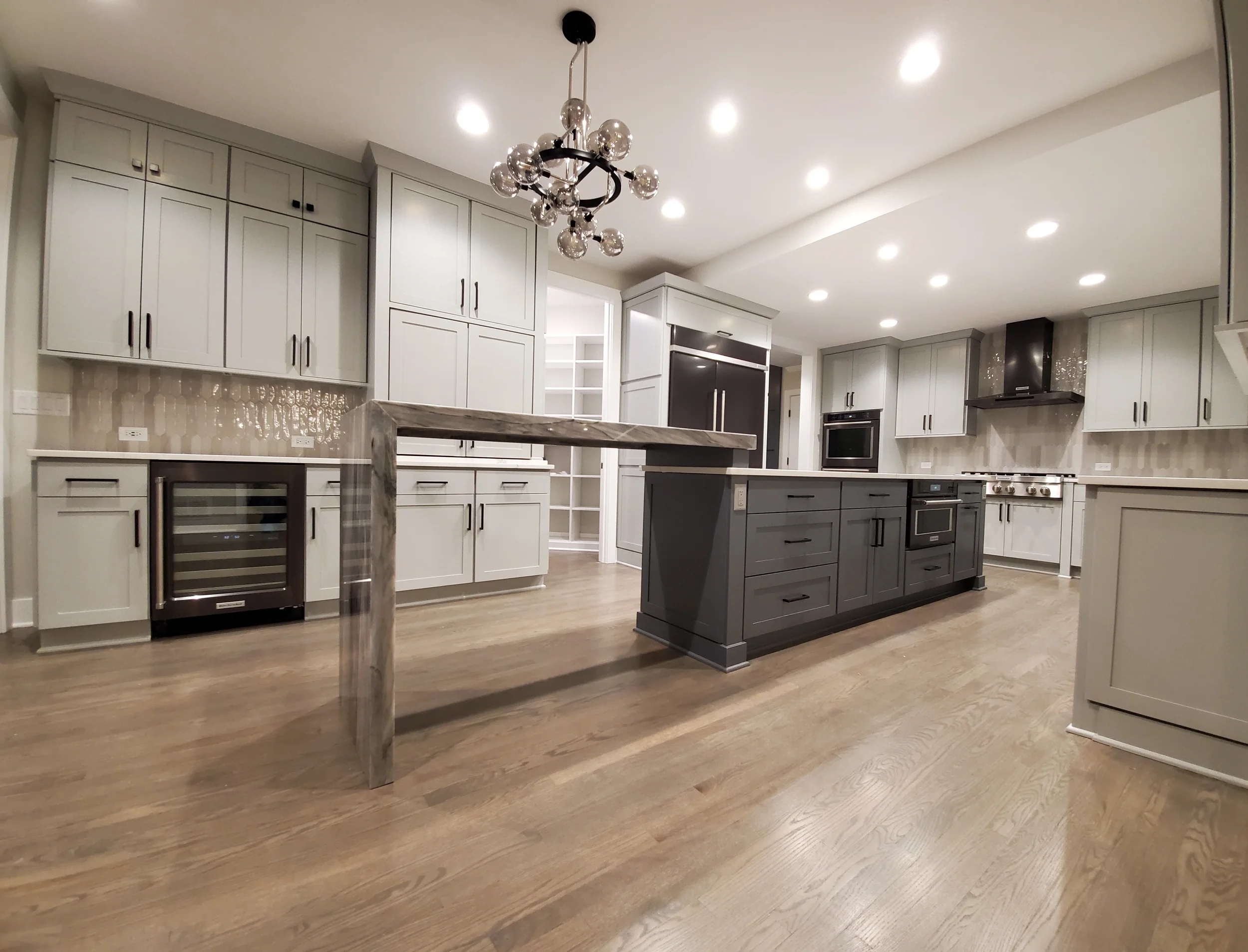 Luxury kitchen cabinet refinishing project by Kora Pro Painting in Hinsdale and Naperville, IL.