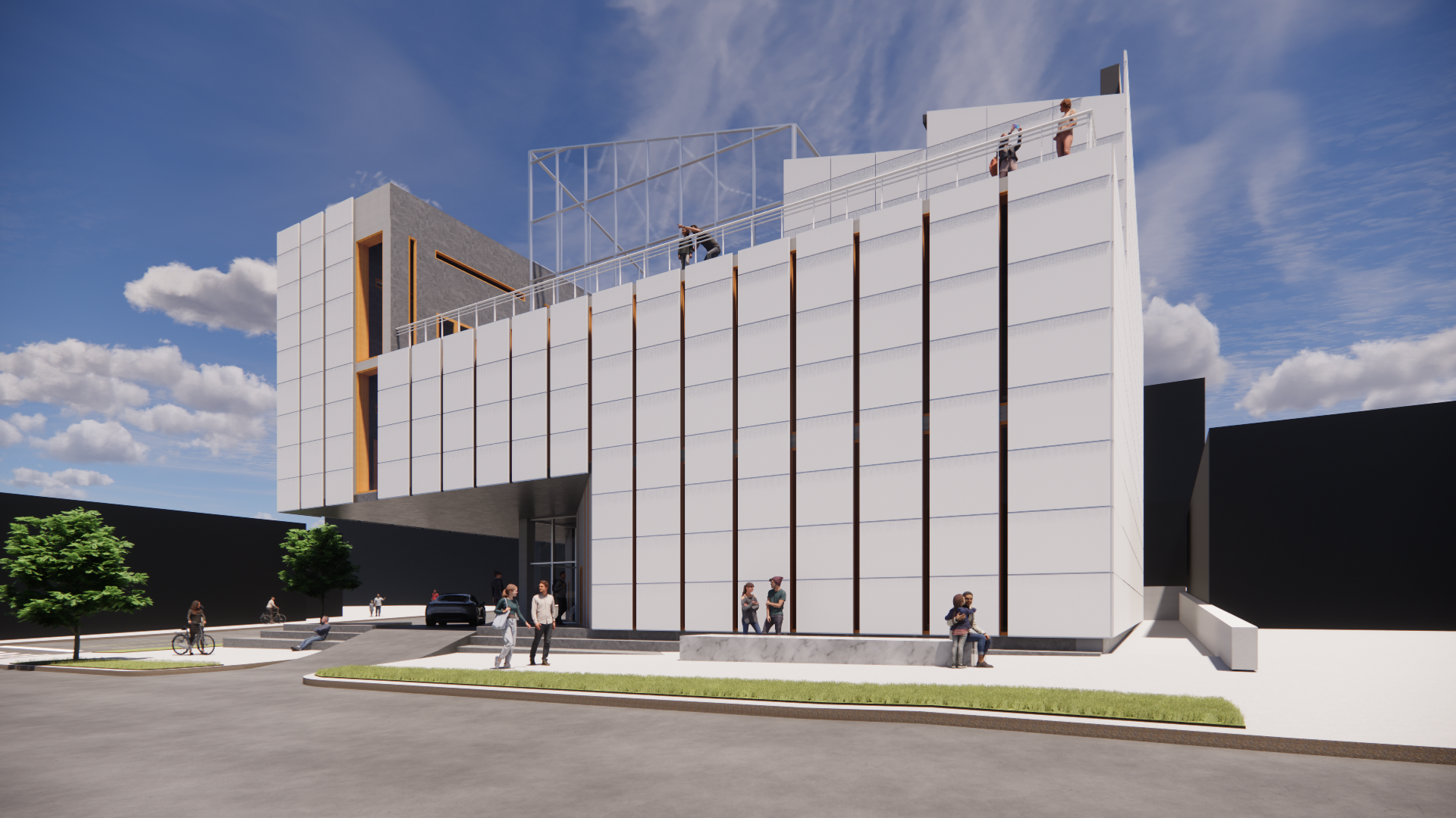 Modern multi-story white building with large windows and wooden accents, with people walking and sitting outside, surrounded by trees and a parking area, under a blue sky with scattered clouds.