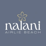 Logo for Nalani Airlie Beach with a stylized flower above the text.