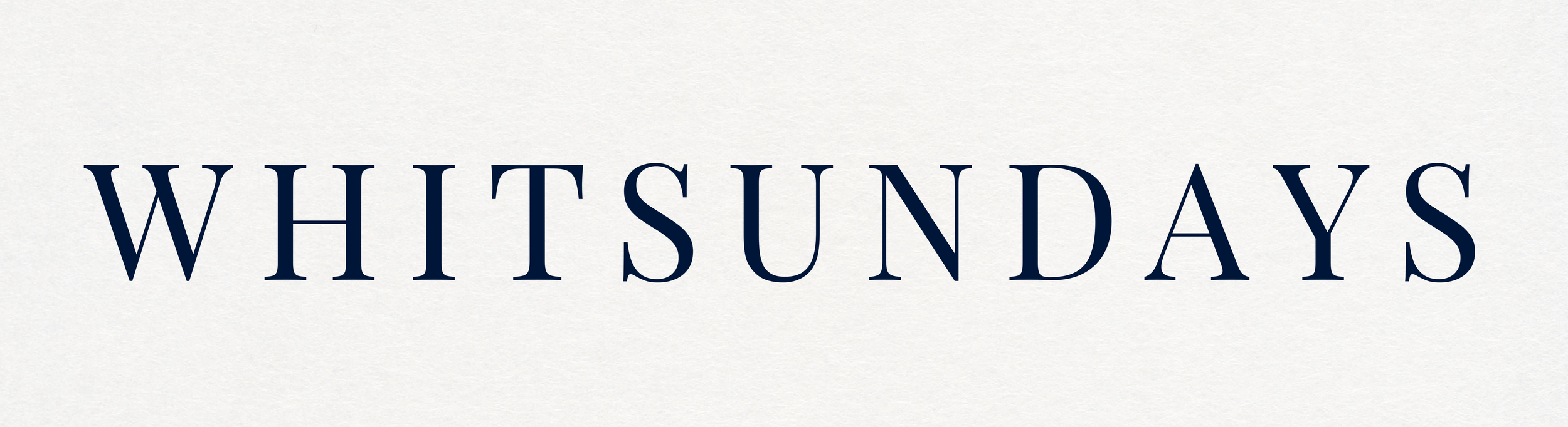 Text that reads 'WHITSUNDAYS' in large dark blue letters on a light background.
