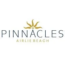 Pinnacles Airlie Beach logo with a stylized sun or palm design above the text