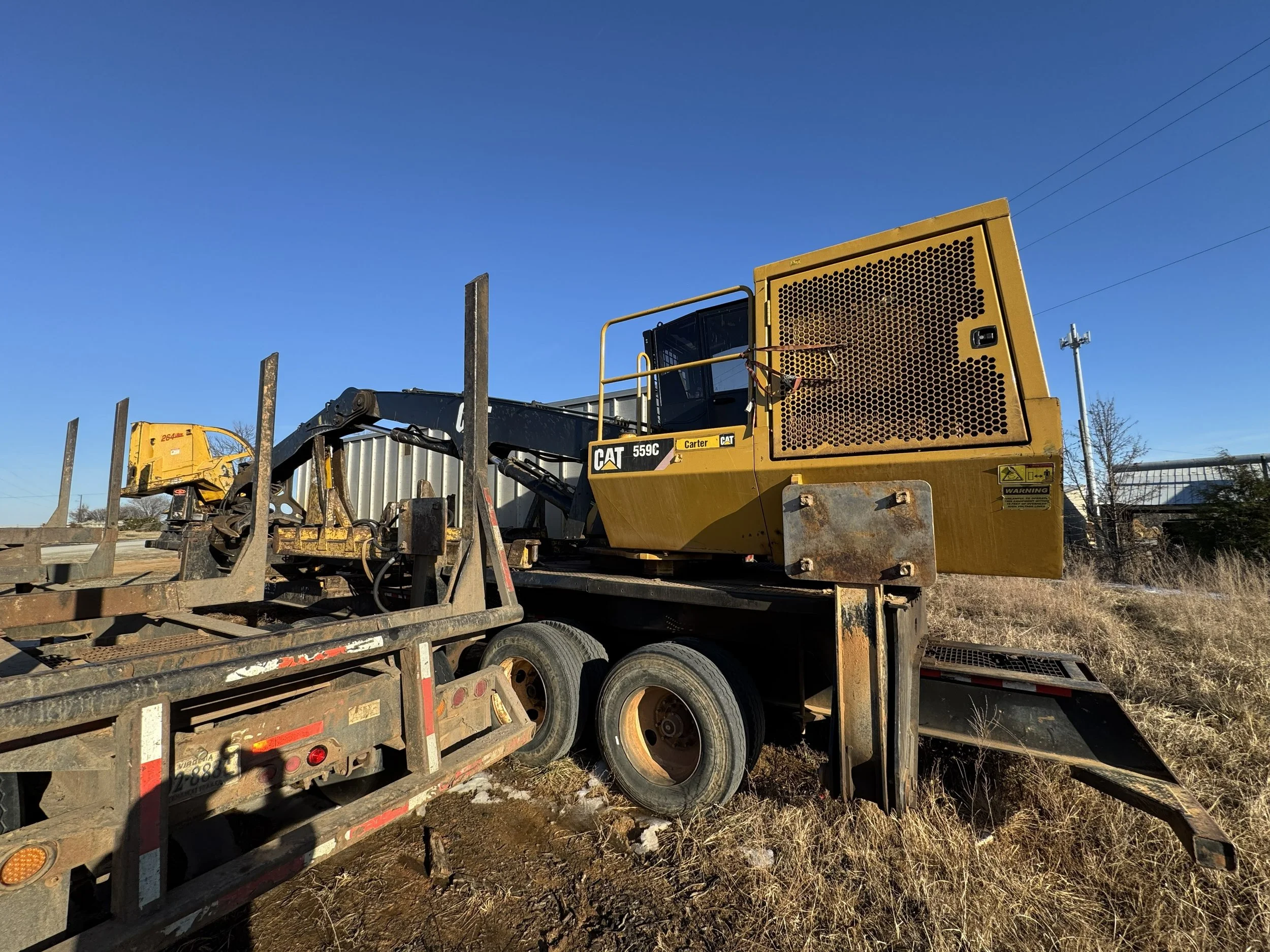 Caterpillar 559C Knuckleboom Loader w/ Delimber