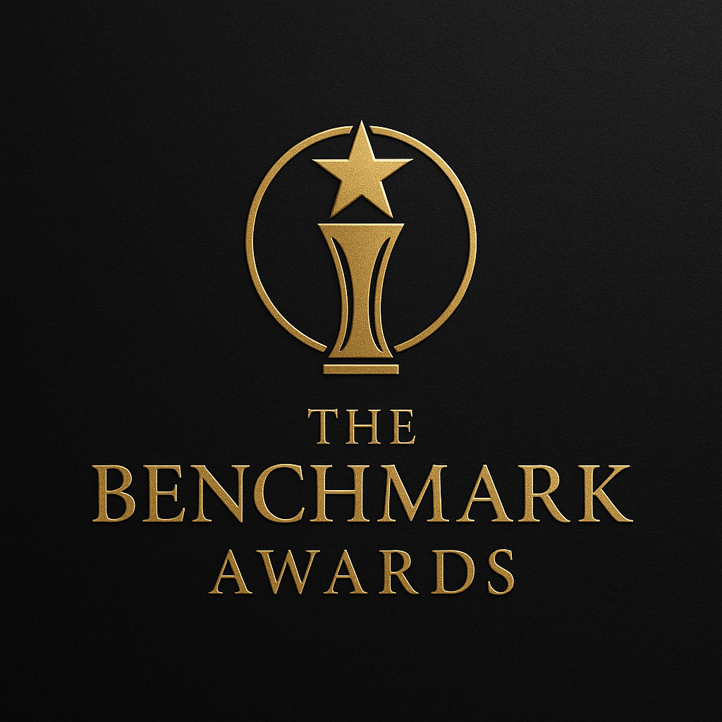 Logo of The Benchmark Awards featuring a gold star and trophy on a black background with gold text.
