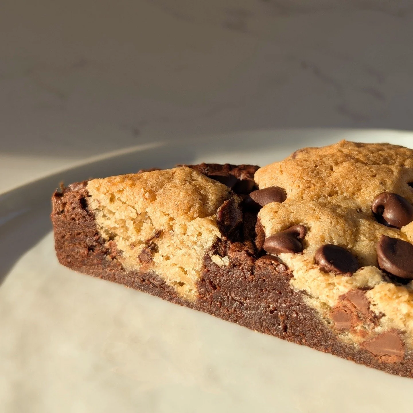 Meet our Brookie bar. It's not revolutionary... but it is near perfection. Fudgy like a brownie, but buttery + flavorful like a cookie. Don't forget to order on the new website by January 11! See you there! 🍪

birdiebearbakehouse.com

#cottagebakery