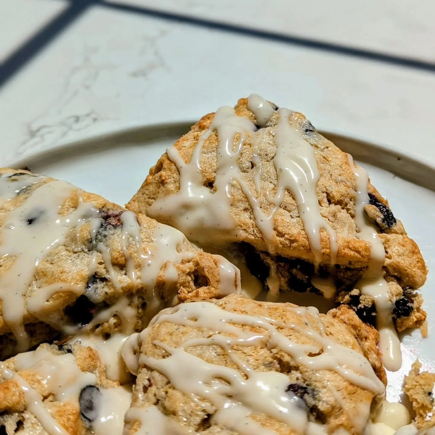 Blueberry scones are always a good decision. ☺️ These berry filled beauties will be on the shelf at @farmsouth_ soon! 🫐 

I just can't get enough of spring recipes so please be patient as everything is berry + lemon flavored on repeat. 😄

#glutenfr