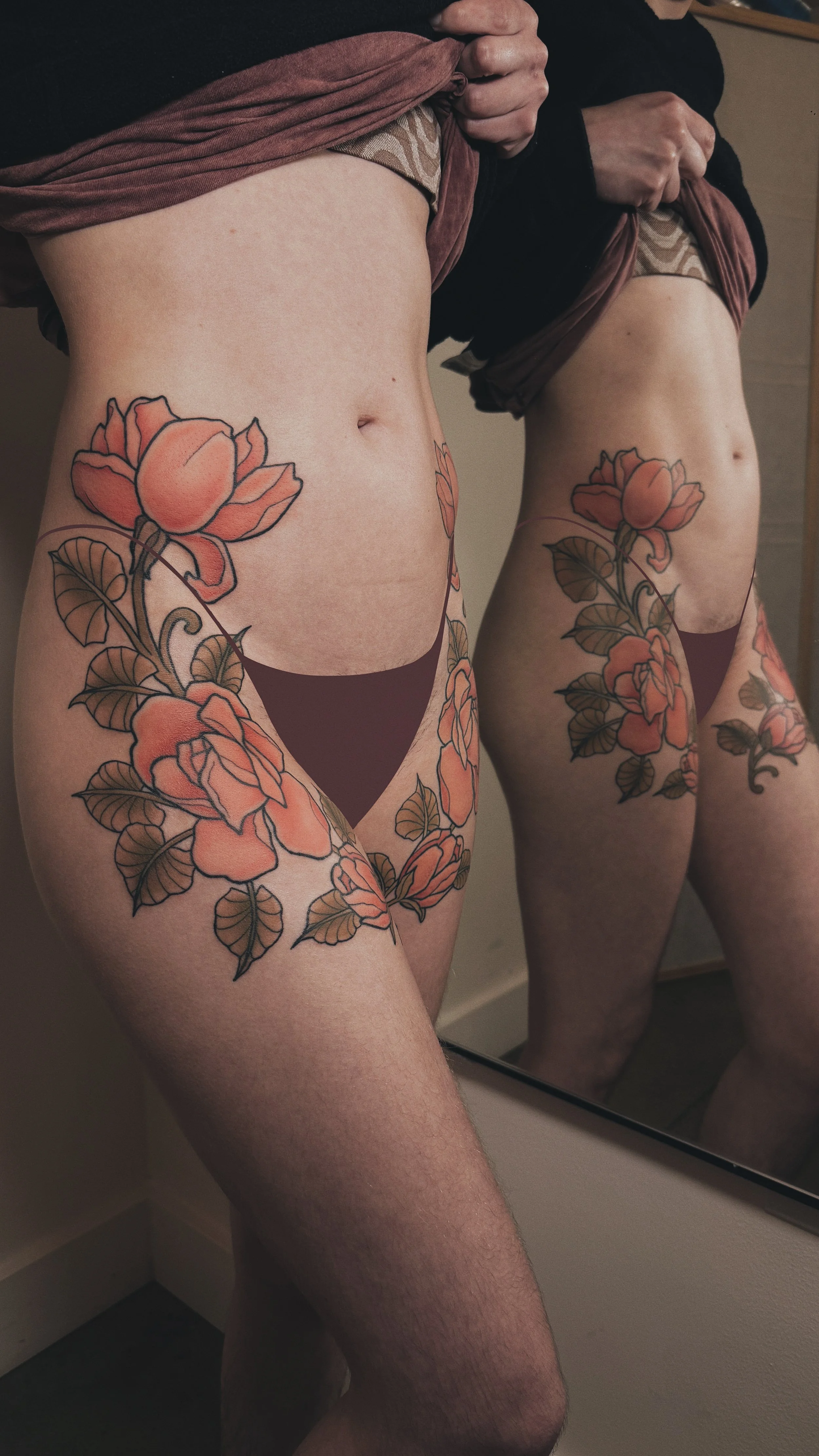 Neoromantic neotraditional floral rose hip body adorning tattoo