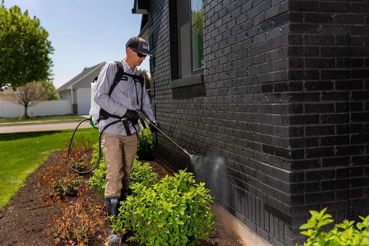 Technician Crew Spraying Exterior Pest Control 1.jpg