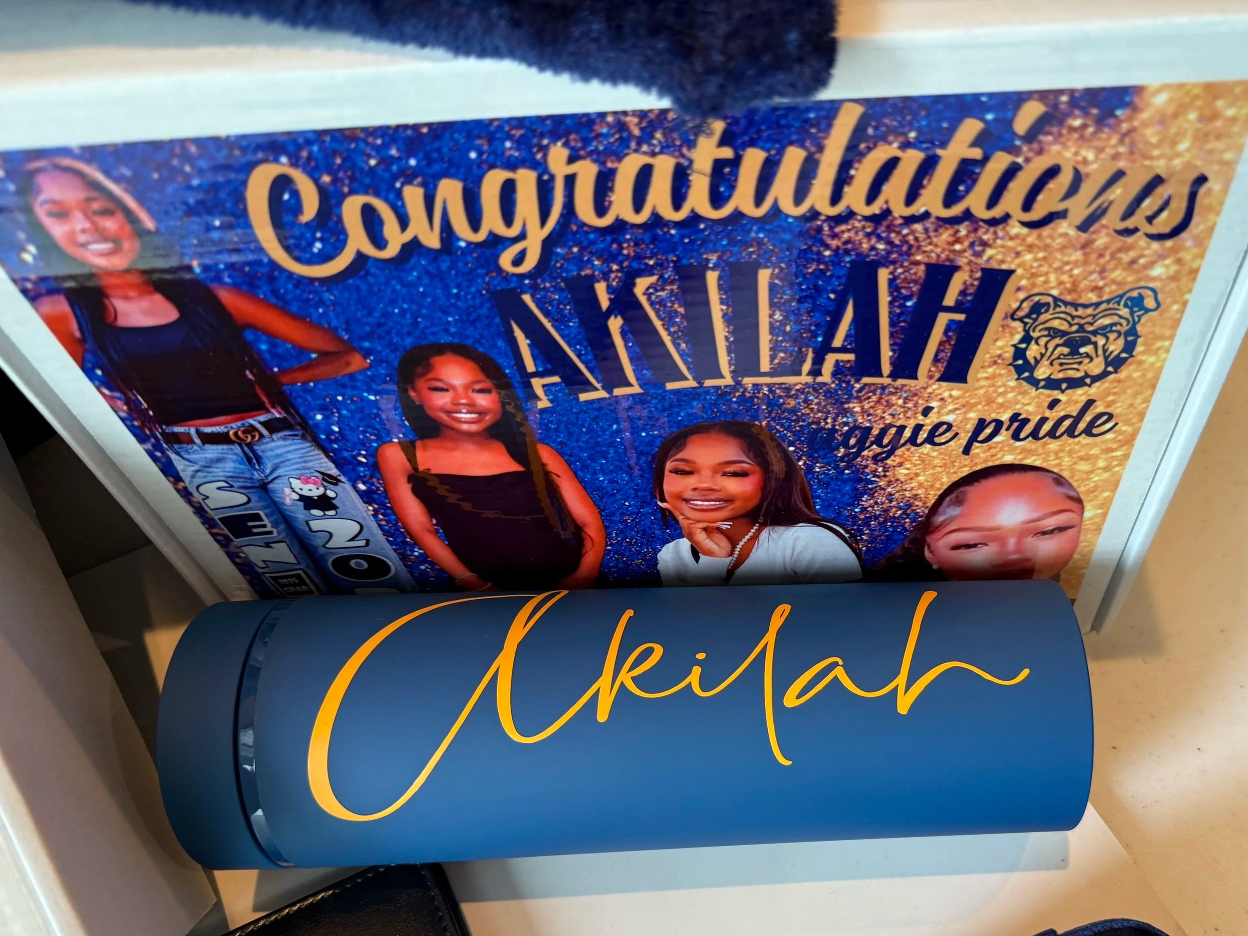 A College Decision Gift Box is a customized, ready-to-gift set made to celebrate the student’s big next step in a fun, practical way. Each item is personalized with the student’s name, school colors, class year, and the college they’re committed to—m