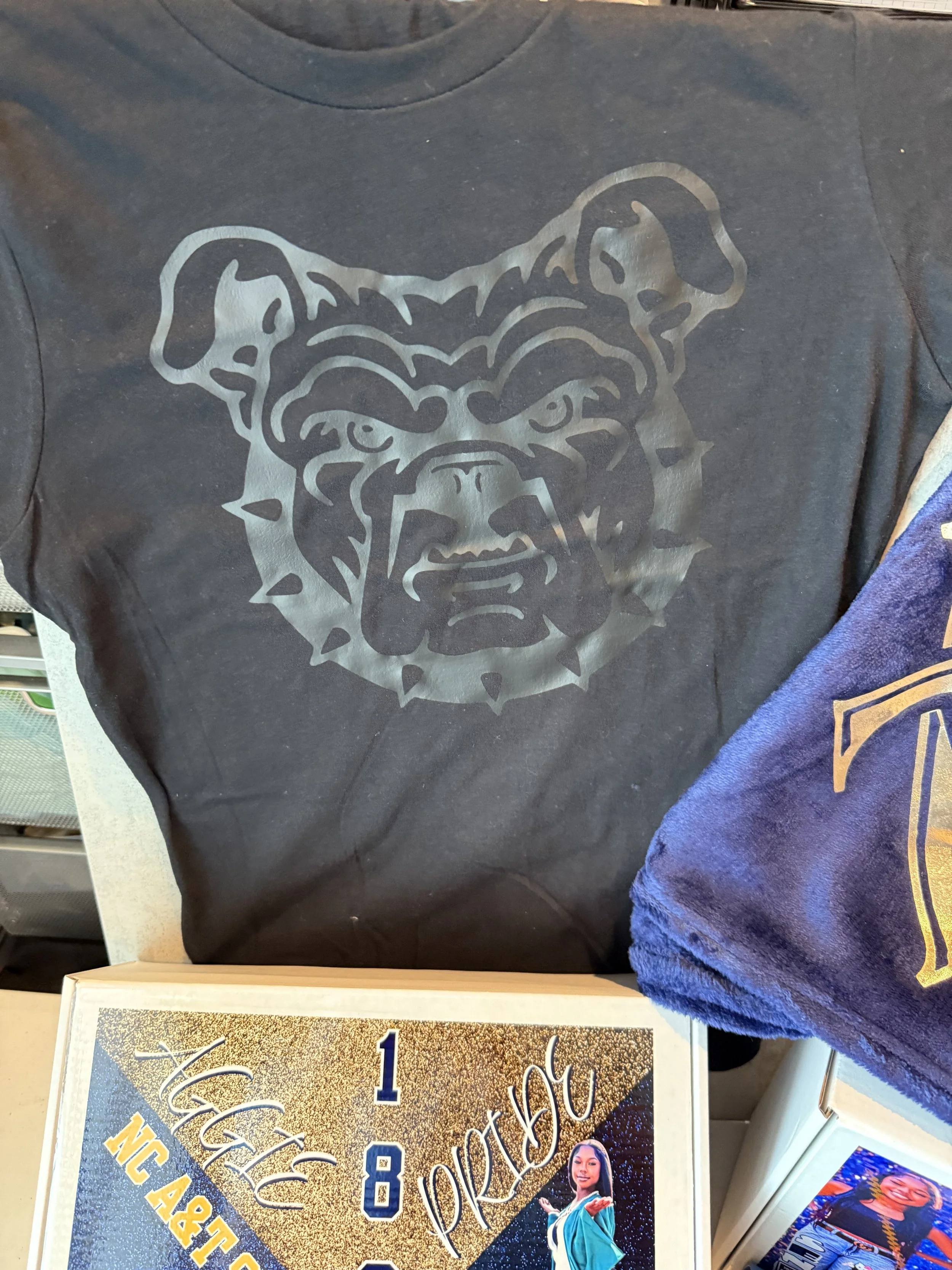 Celebrate your senior’s big year with custom apparel designed to honor their achievements and upcoming graduation. From shirts and sweatshirts to personalized designs featuring names, photos, school colors, and class year, senior apparel is a fun and