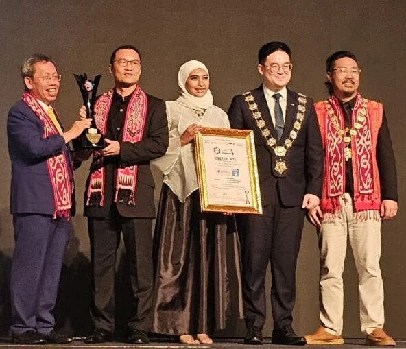 Us with our client winning JCI 2025 Award