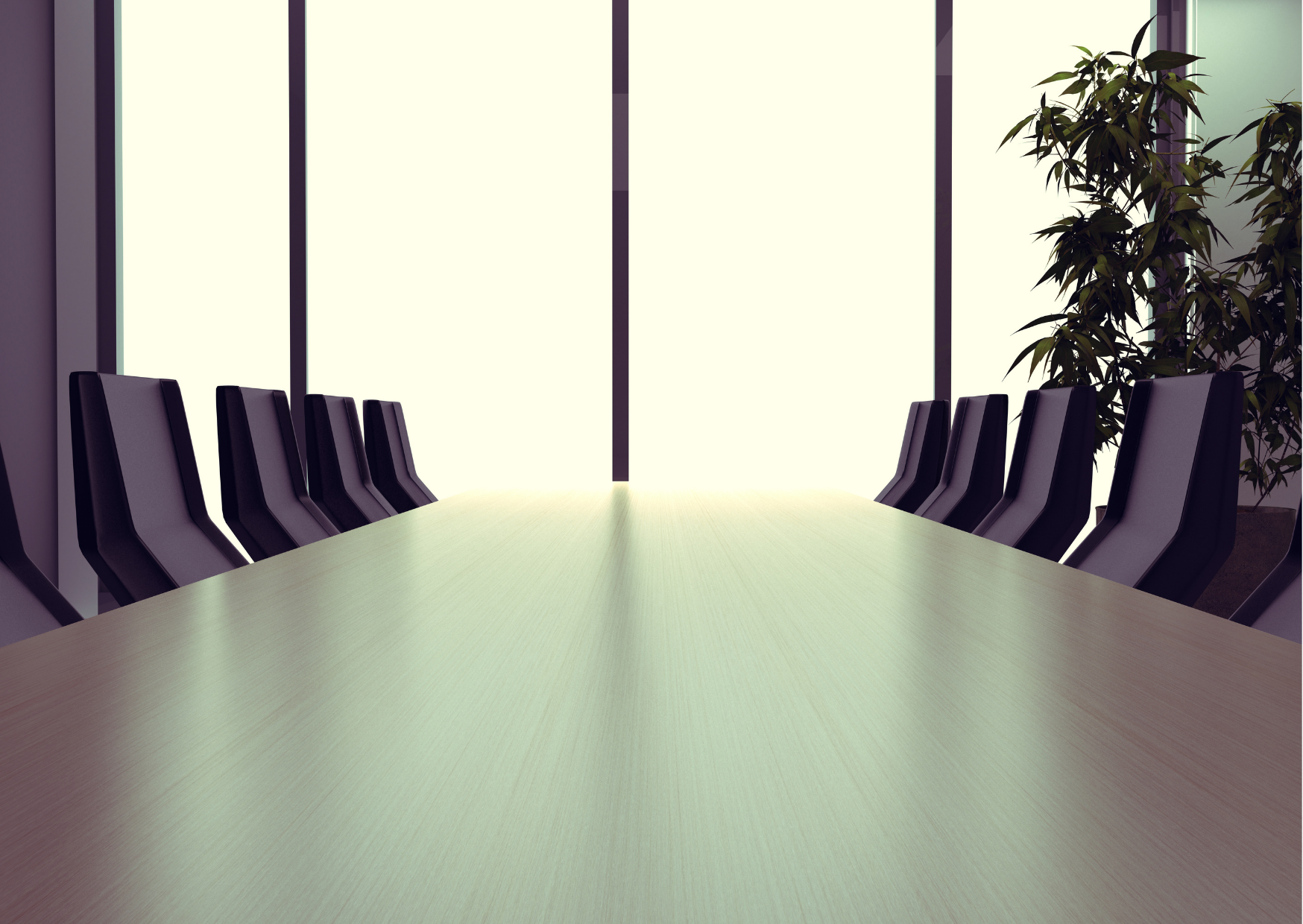 Bir şirketin toplantı odası içerisindeki uluslararası toplantı masası ve boş sandalyeler.