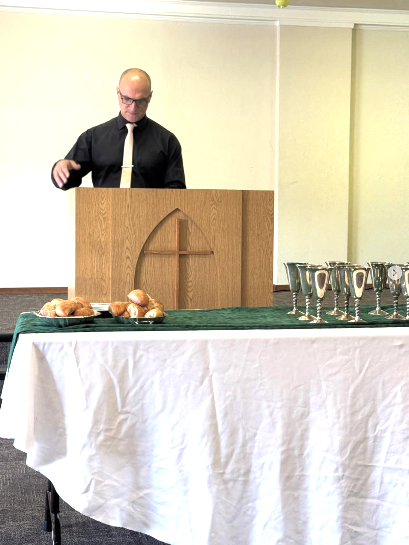 Pastor Troy Martin Preaching Over Communion Elements