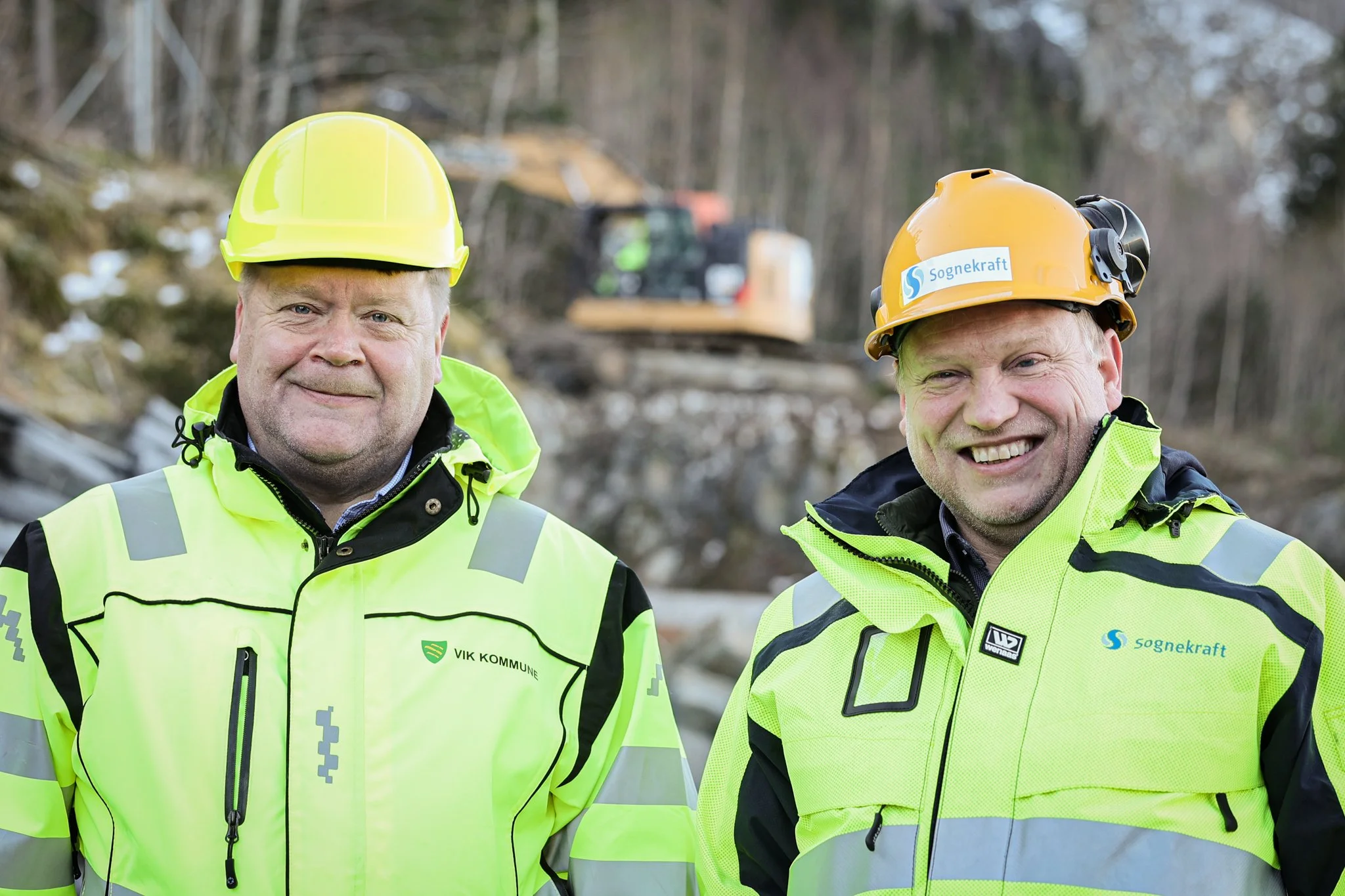 Roy Egil Stadheim og Terje Bakke Nævdal med hjelm på hovudet i Feios.