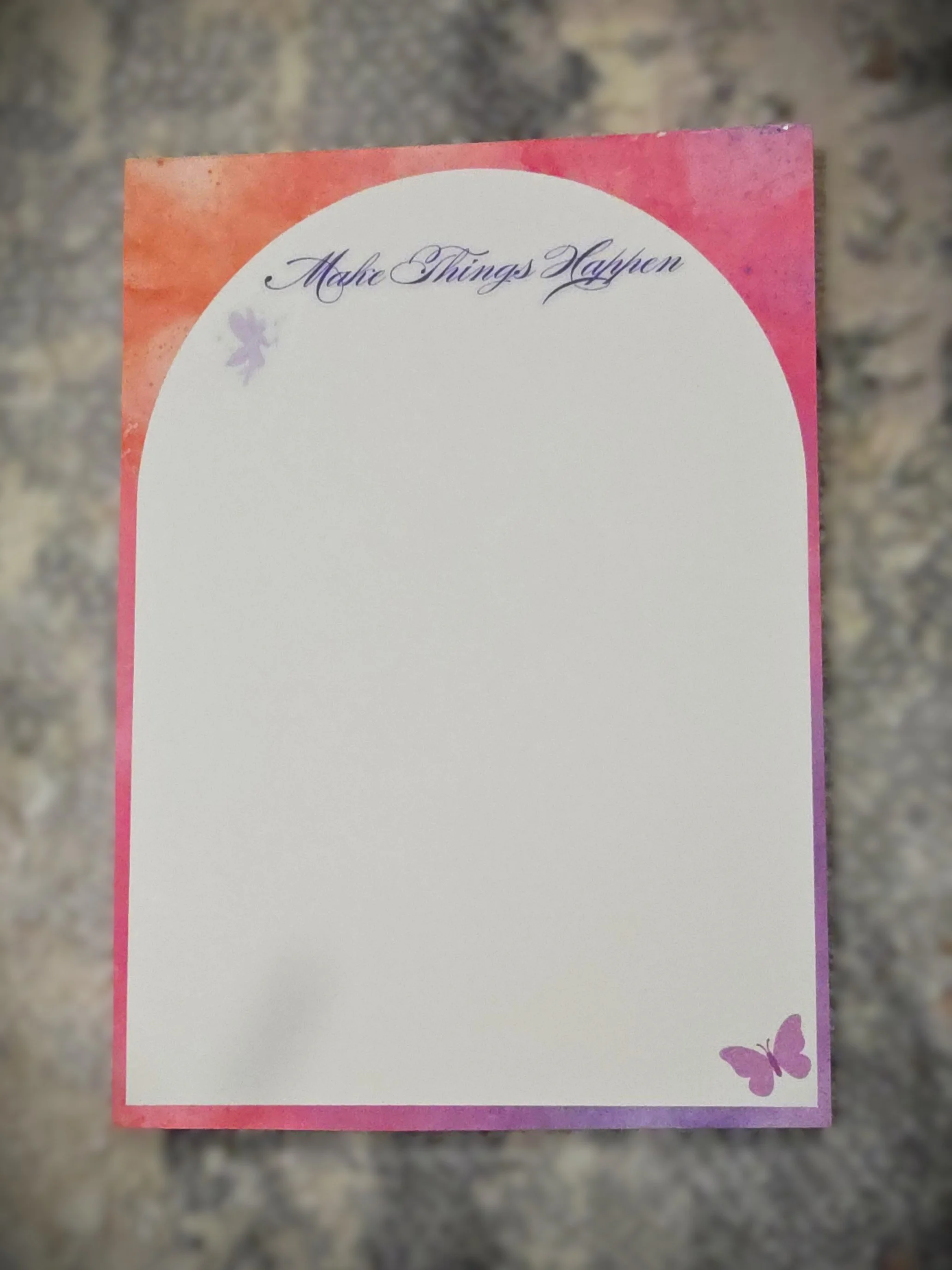A decorative card with a pink and orange watercolor background, featuring the phrase "Make Things Happen" at the top and two purple butterfly illustrations, one near the top left and one near the bottom right corner.