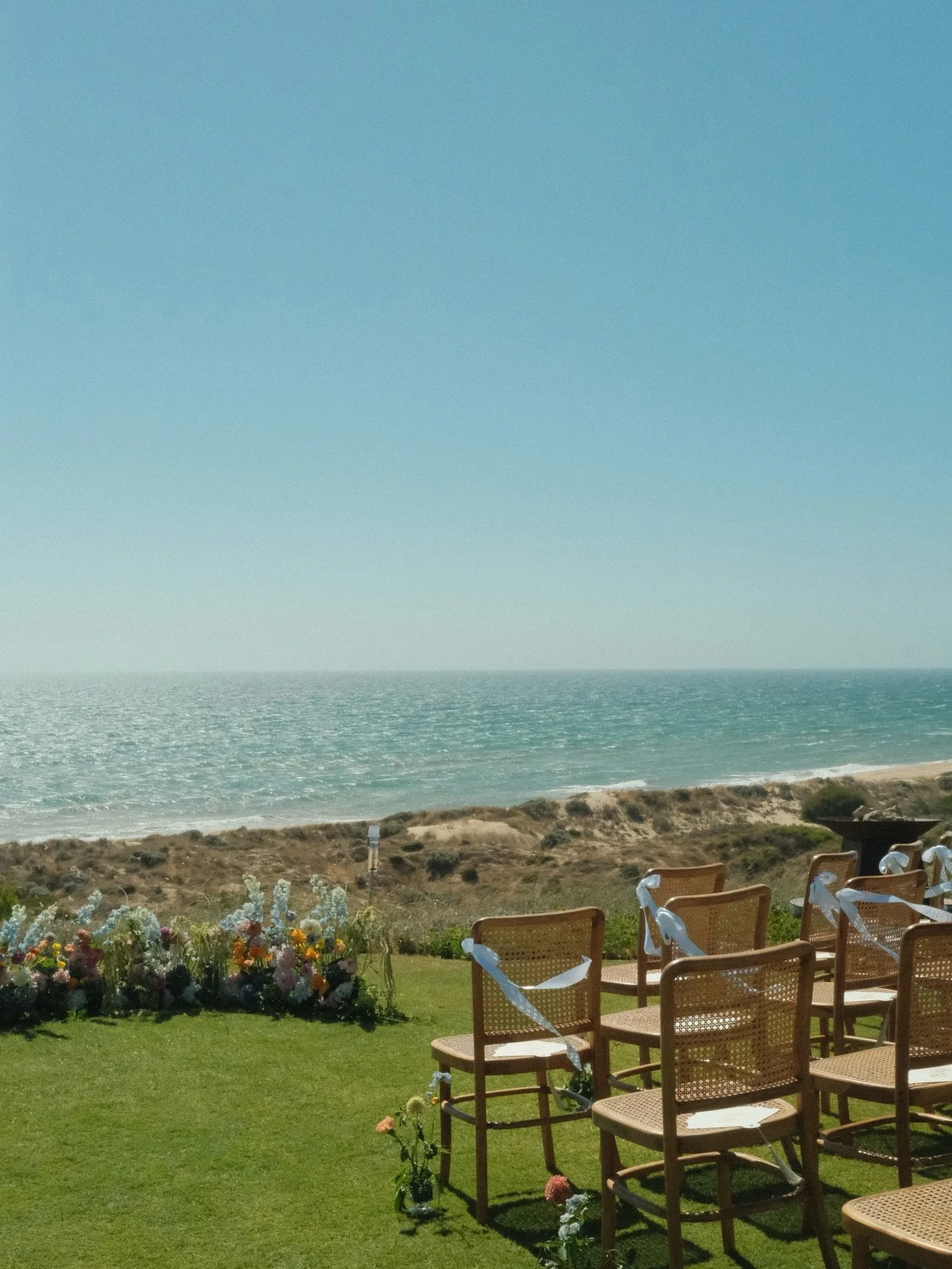 The wind was wild and the vibe was high 

Ben &amp; Jane, on the edge of the ocean with @markturnermusic on sax to form our favourite pinnacle &ldquo;trio&rdquo;.

Cannot get enough of summer weddings 💘