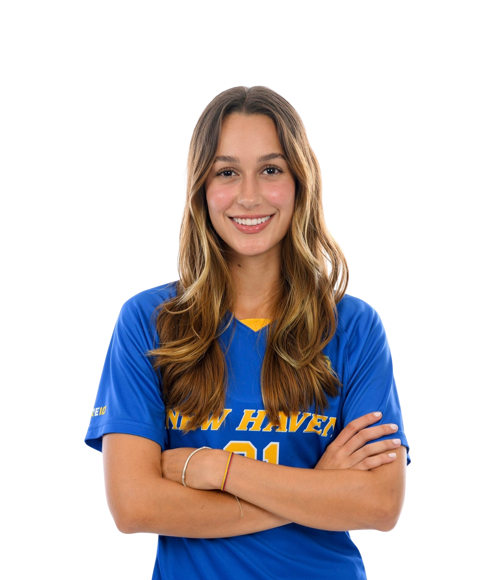 Young woman smiling, wearing a blue sports jersey with 'New Haven' and the number 21, with her arms crossed.