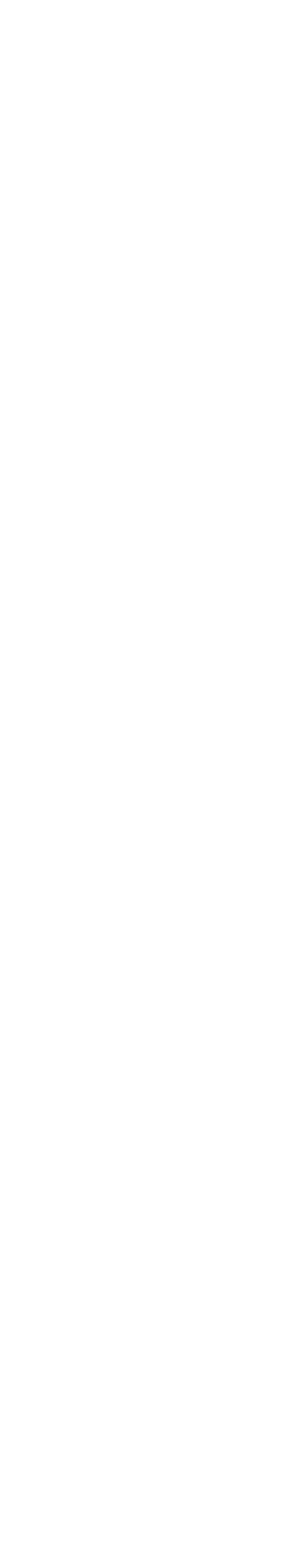 A tall, black and white striped pole standing vertically against a black background.
