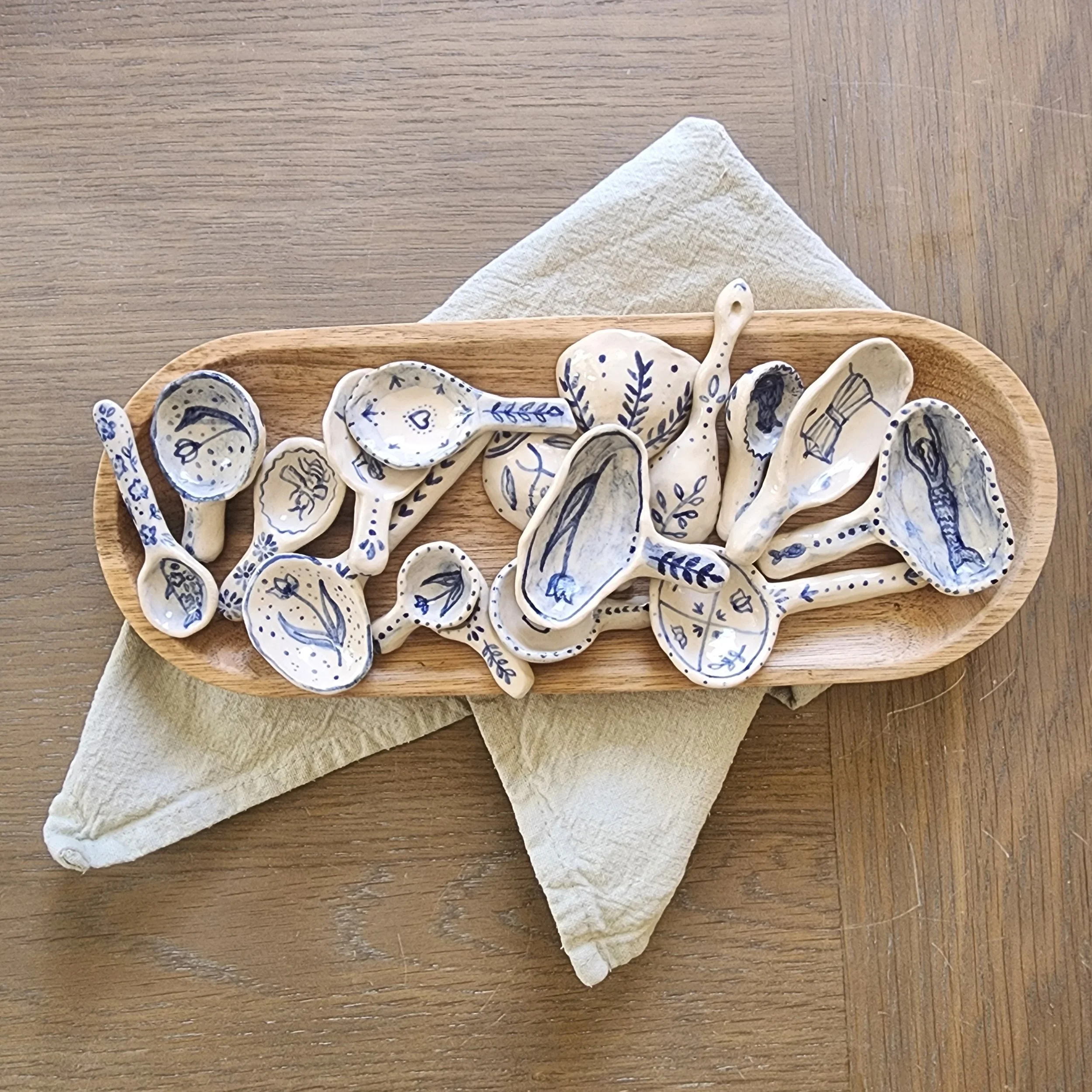 Ceramic spoons  - Can be used functionally, for example as a salt spoon, or hung as decor. All spoons have designs on both sides. 

Dishwasher safe. 

Price: All priced between £15-20 depending on size and design, plus shipping (and taxes if outside 