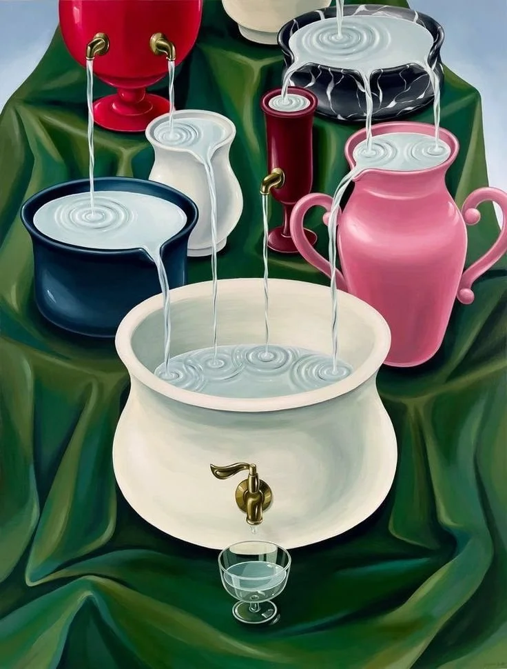 Multiple colorful pitchers and containers pouring water into a large white basin with a brass spigot, set on a green cloth with a glass of water in front.