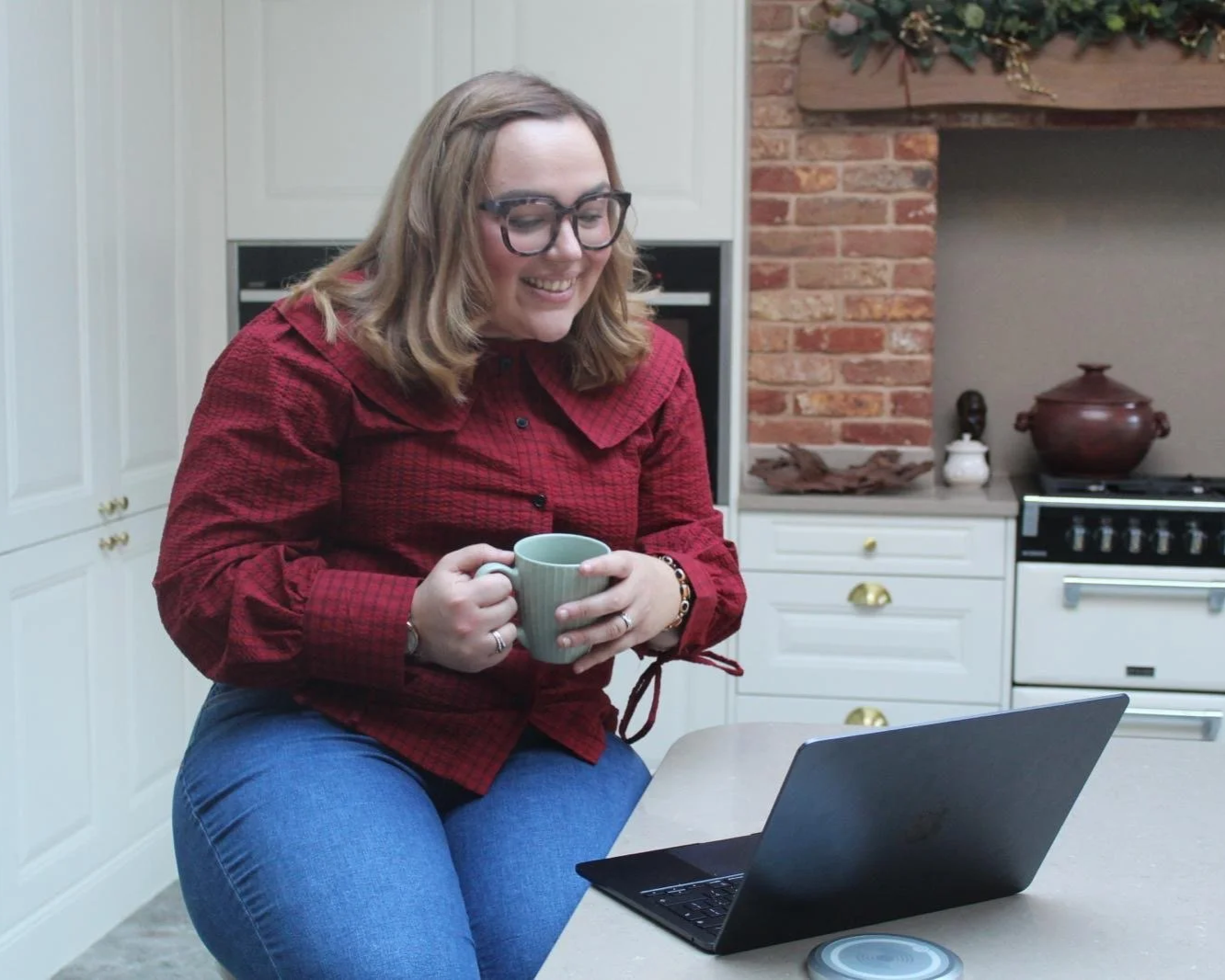 Marketing Collab founder sat in front of laptop