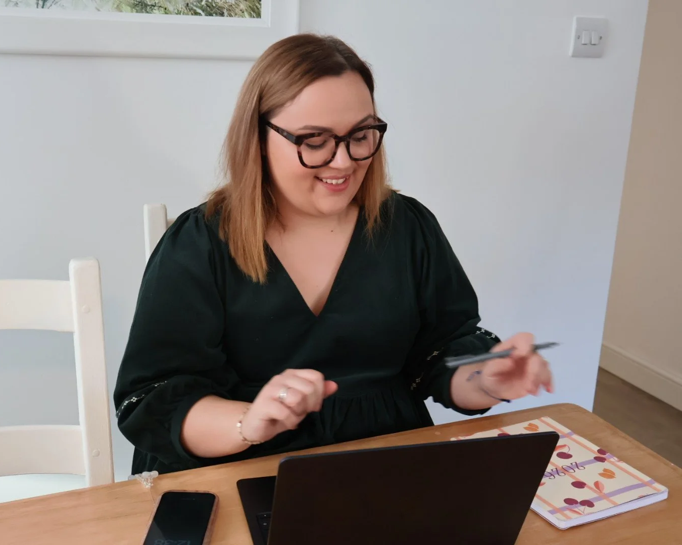Marketing Collab founder Lauren working at laptop