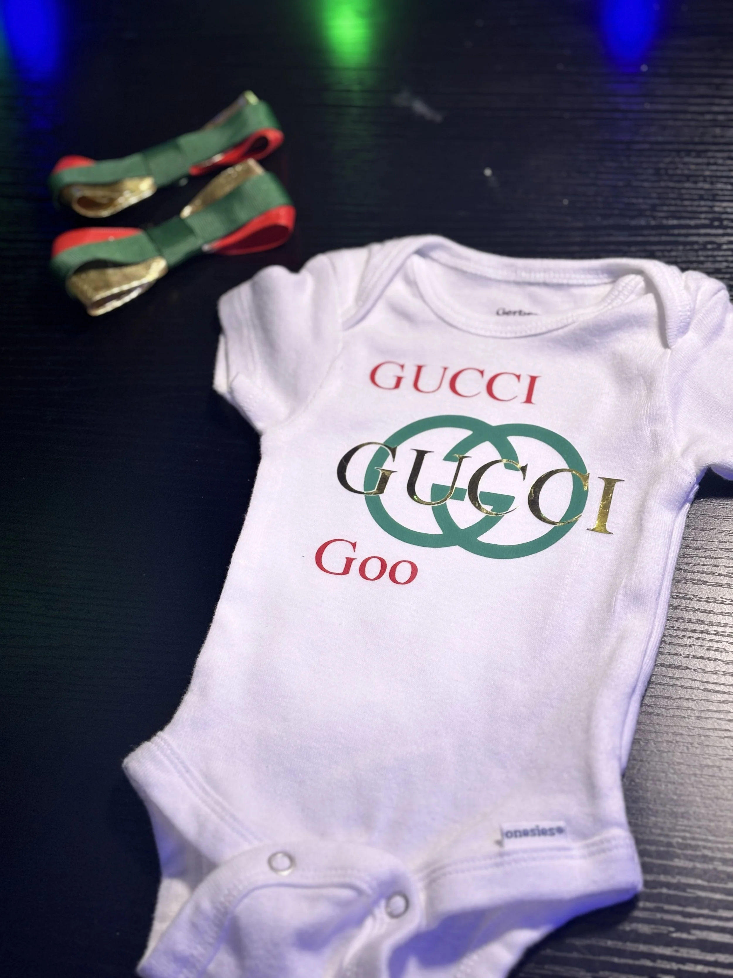 Gucci_goo_onsie.jpg