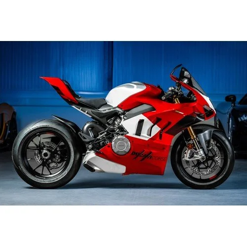 Red and white Ducati Panigale V4 motorcycle on showroom floor