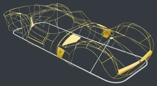 3D model of a race car frame with gold and black components.