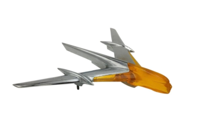 A silver toy jet airplane with an orange canopy.