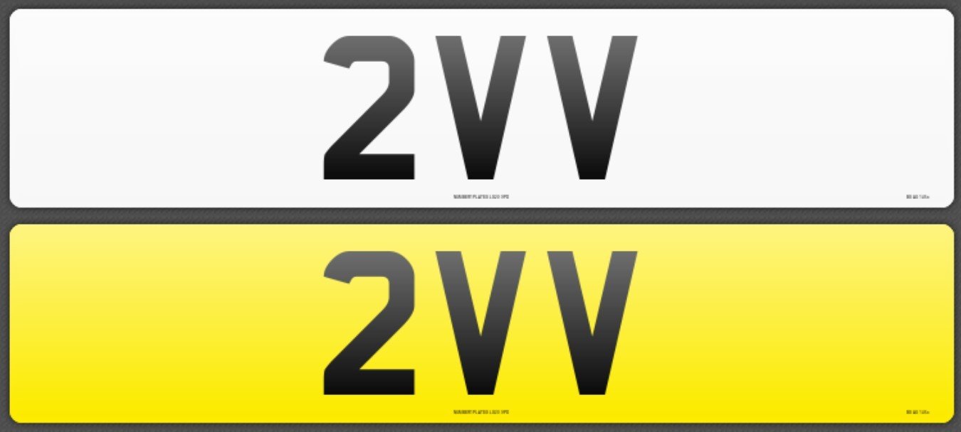Two license plates, one white and one yellow, both displaying the characters '2VW' in large black font.