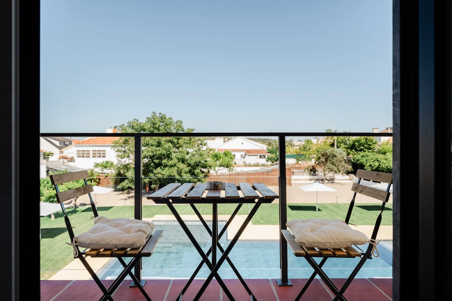 Suite Junior com vista para a piscina - Varanda e vista para a piscina