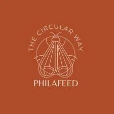Logo for The Circular Way Philafeed, featuring a stylized geometric design and text on a brown background.