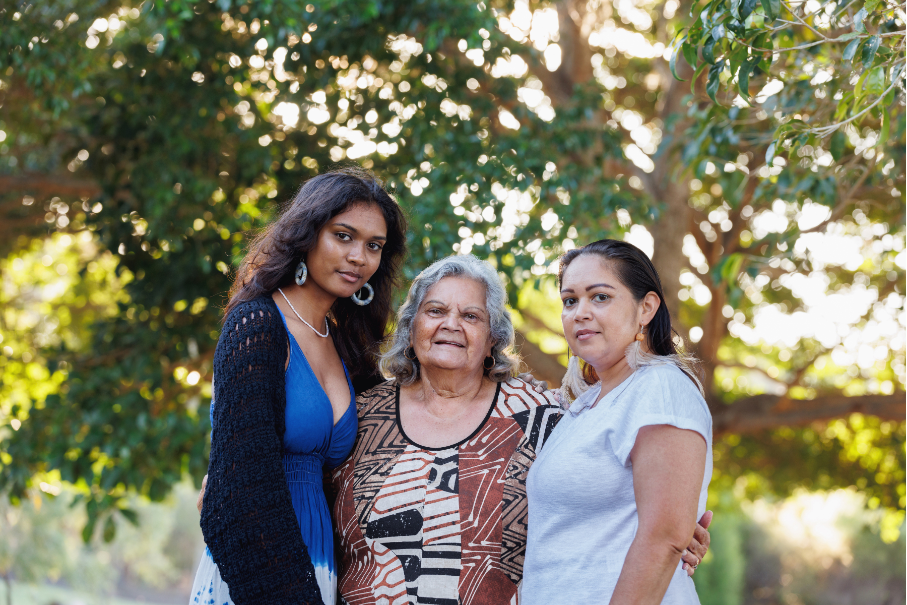 Indigenous Australian family including grandmother, mother and daughter