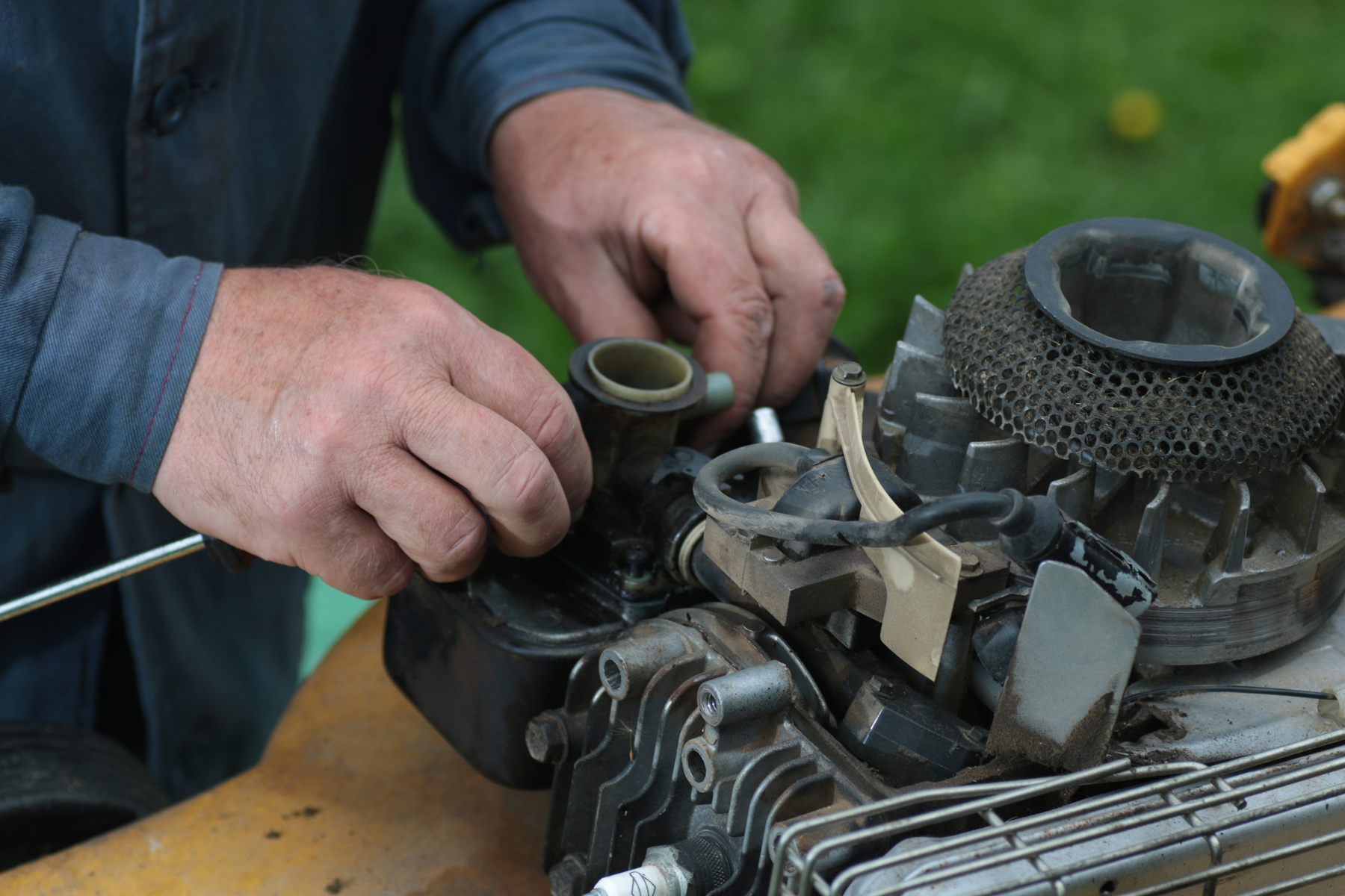 Trainee completing certificate in outdoor power equipment technology