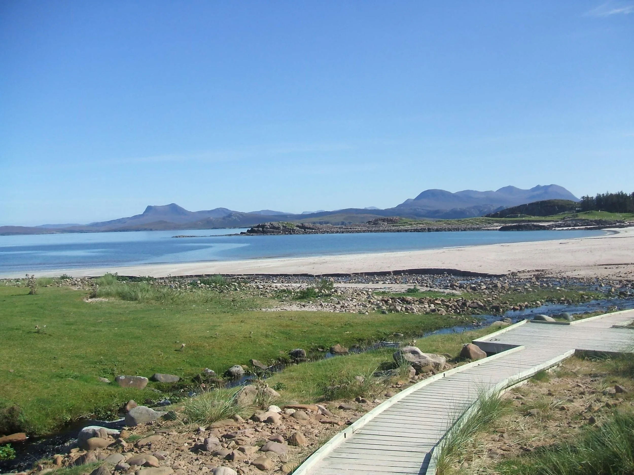 mellon-udrigle-beach-boardwalk-sea-mountains.jpeg