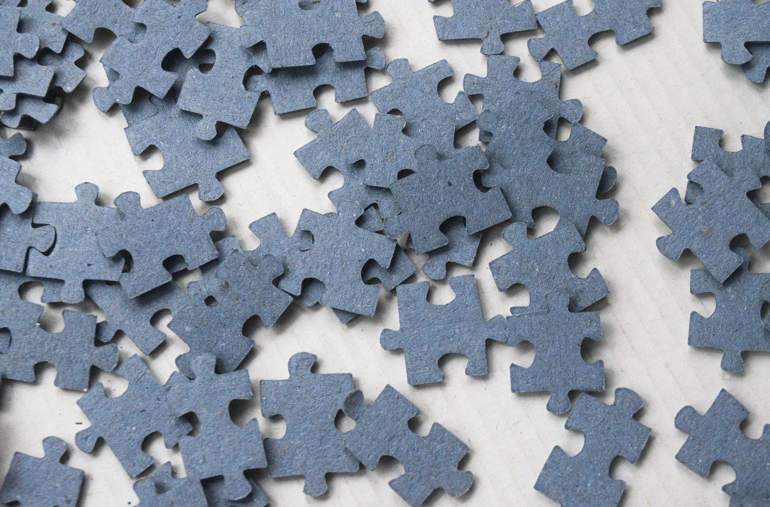 Blue jigsaw puzzle pieces signifying tailored medical device audit solutions provided by GMD Audits.