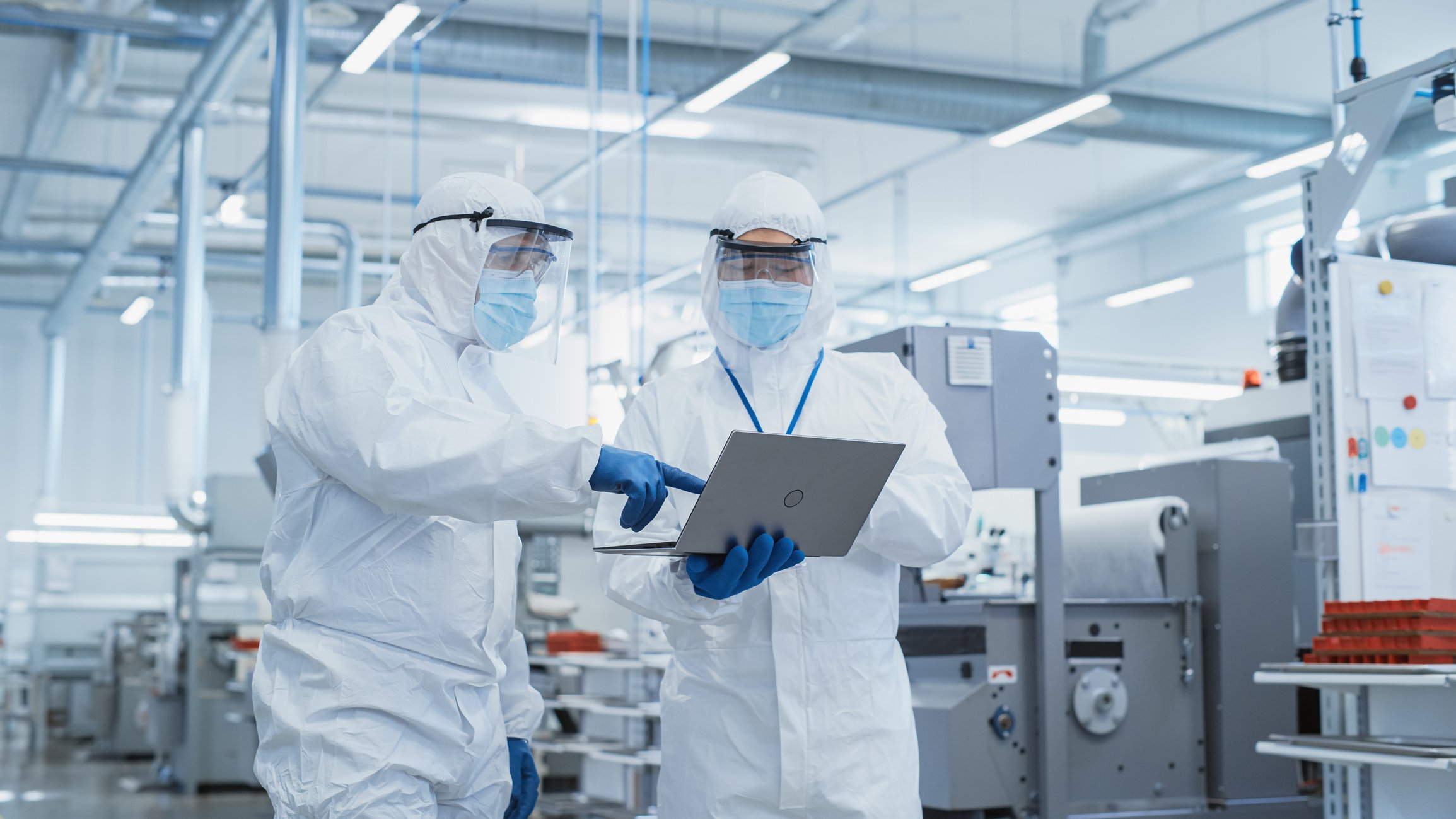 Audit being conducted in a modern medical device production facility.