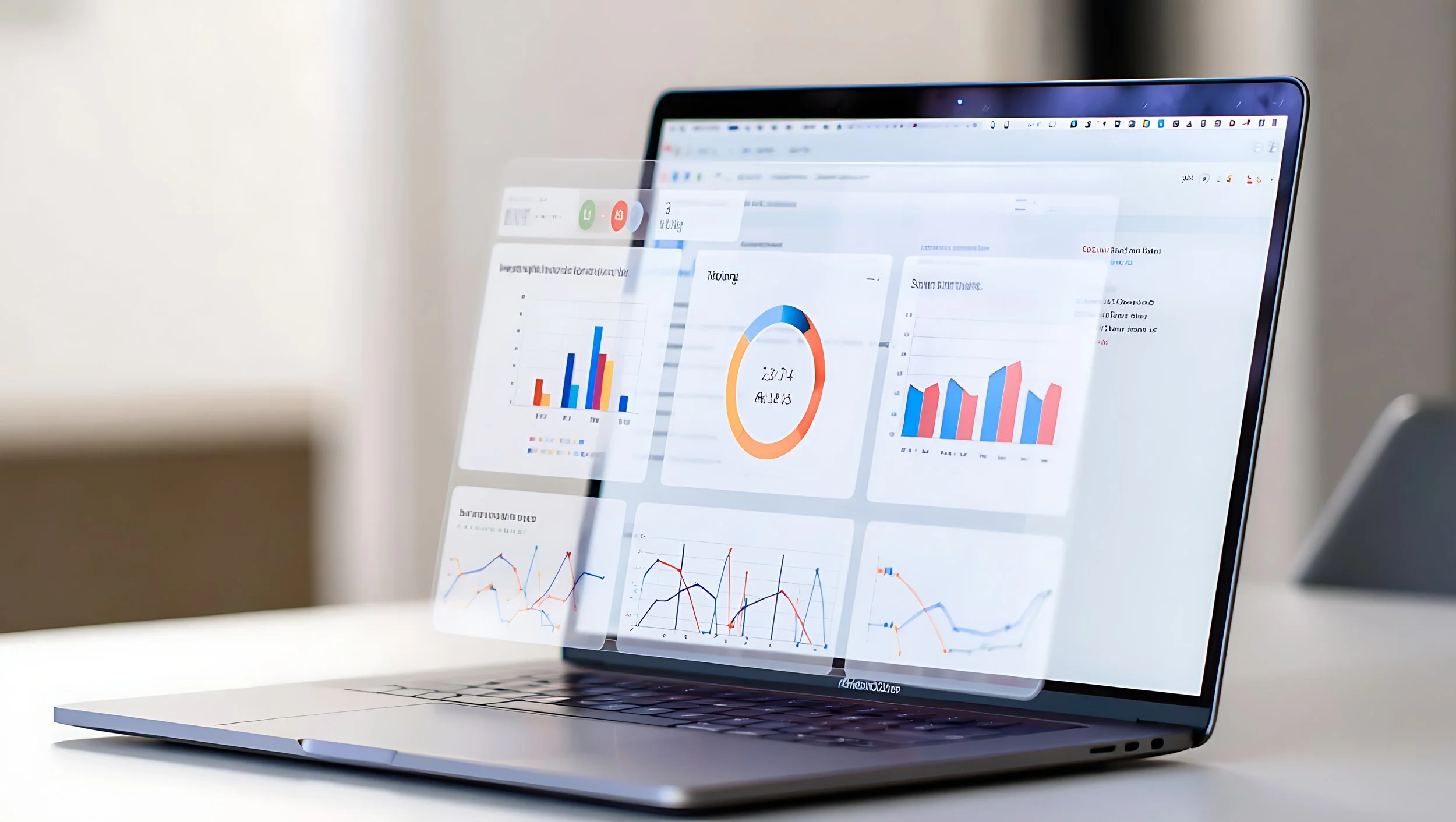 A laptop displaying various business analytics graphs and charts, with a semi-transparent overlay of additional data and icons.