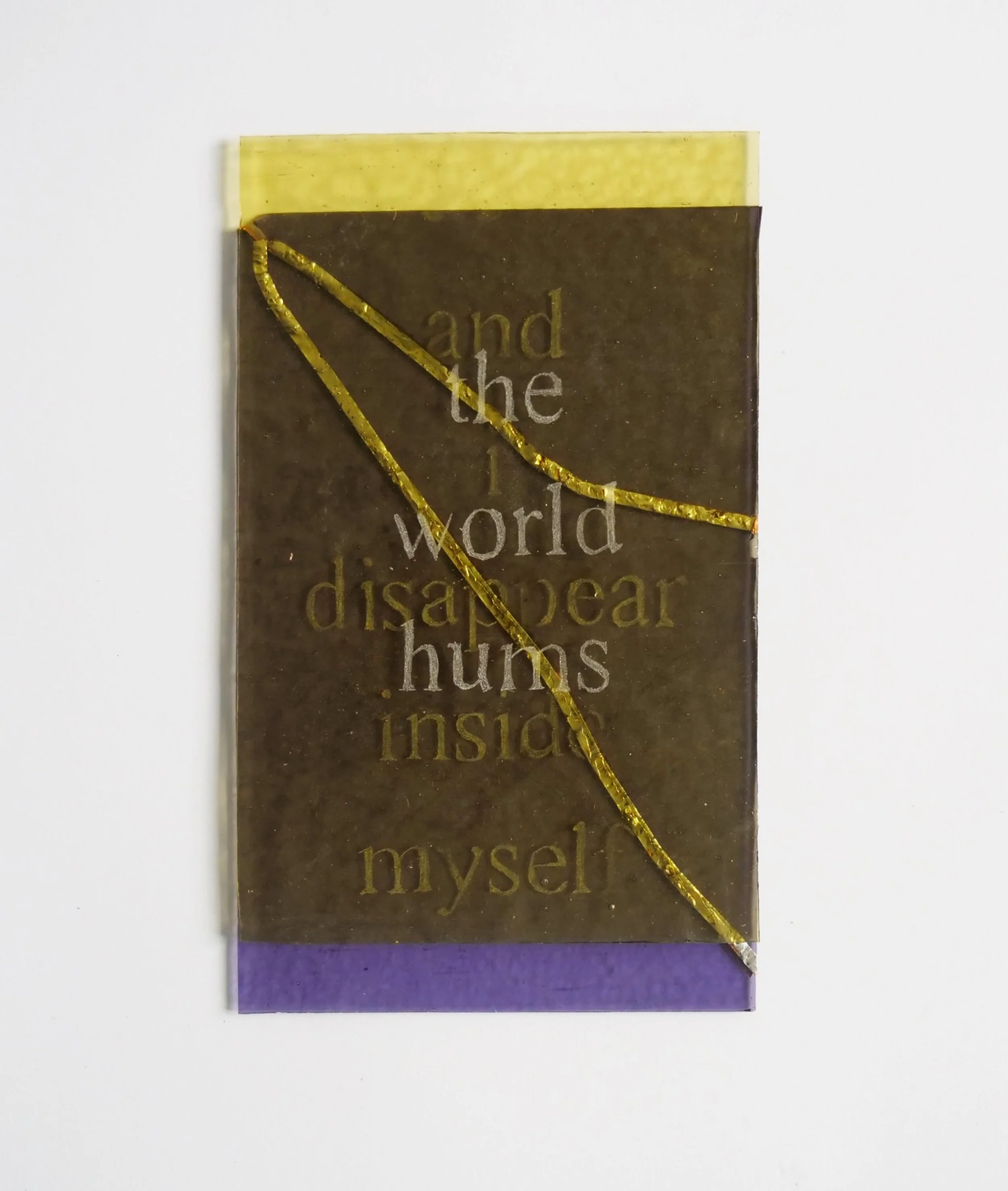 the world hums 
and i disapear inside myself 
(2025)
Etched glass with silver solder 