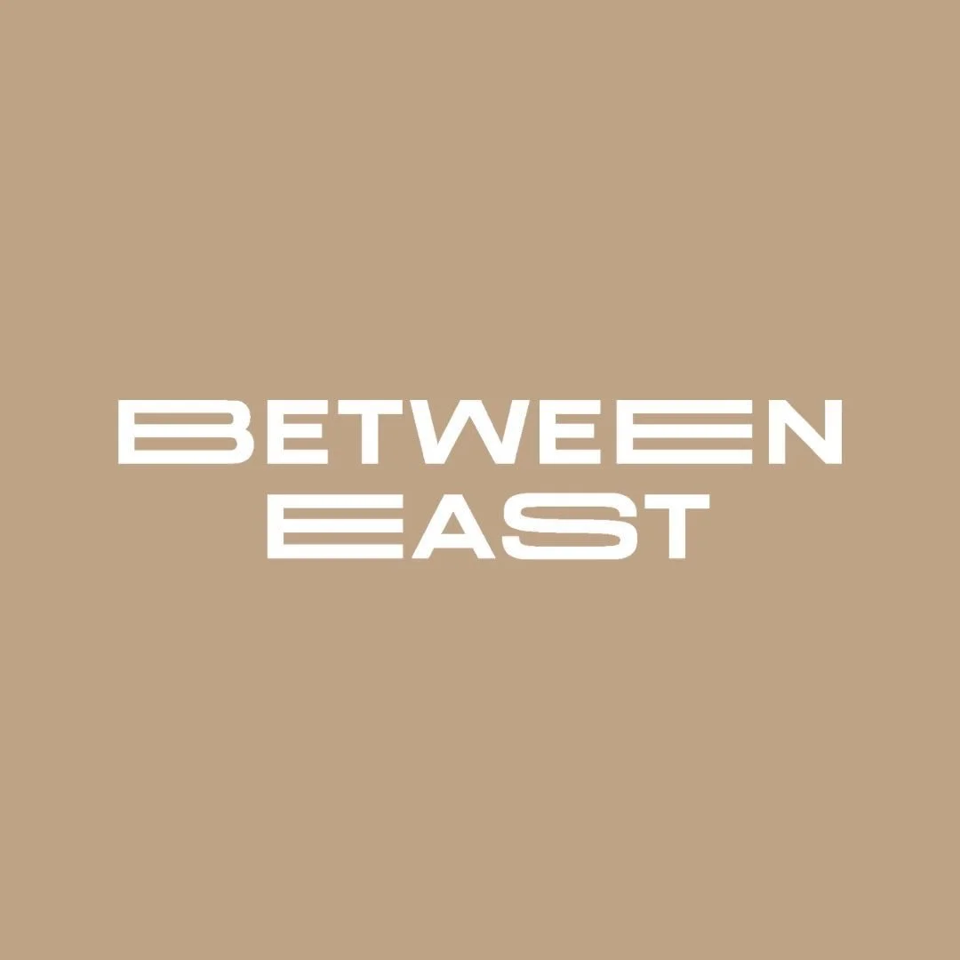 Between East