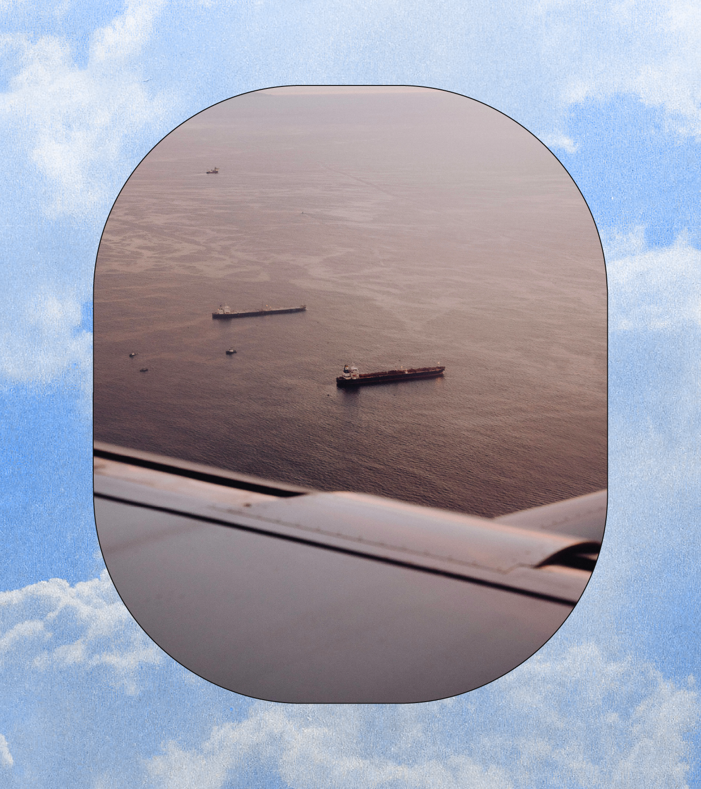 Aerial view of ships and boats on the ocean seen through airplane window with a decorative cloud border background.