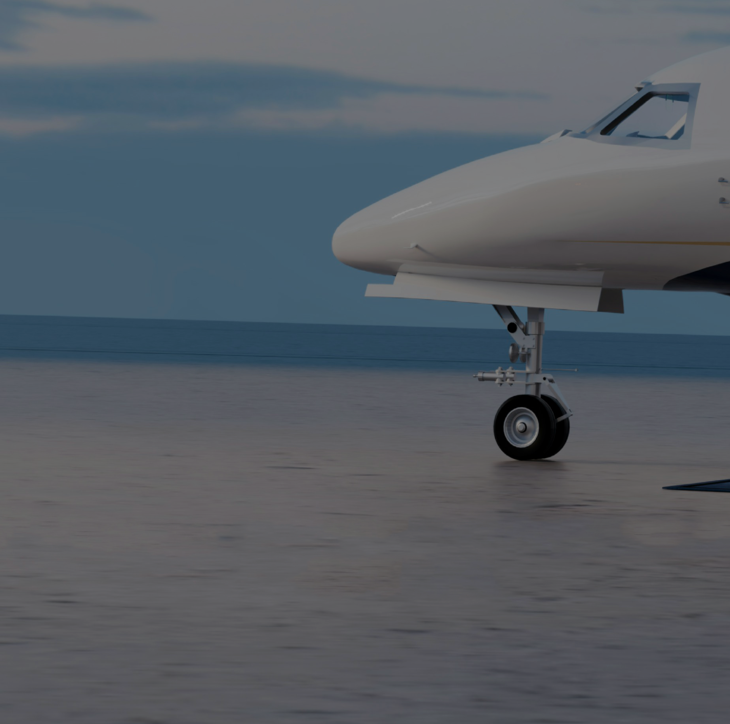 Close-up of the nose and landing gear of a private jet on a clear runway near the ocean.