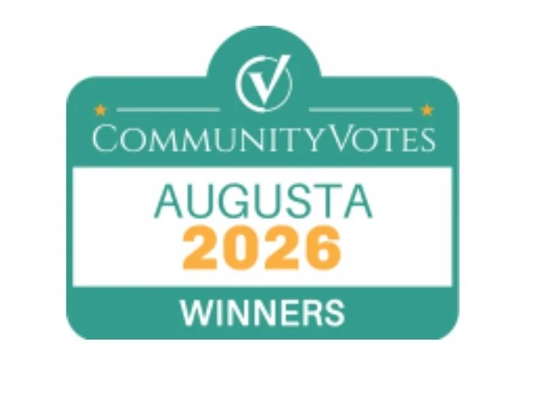 Community votes badge indicating winners in Augusta, 2026.