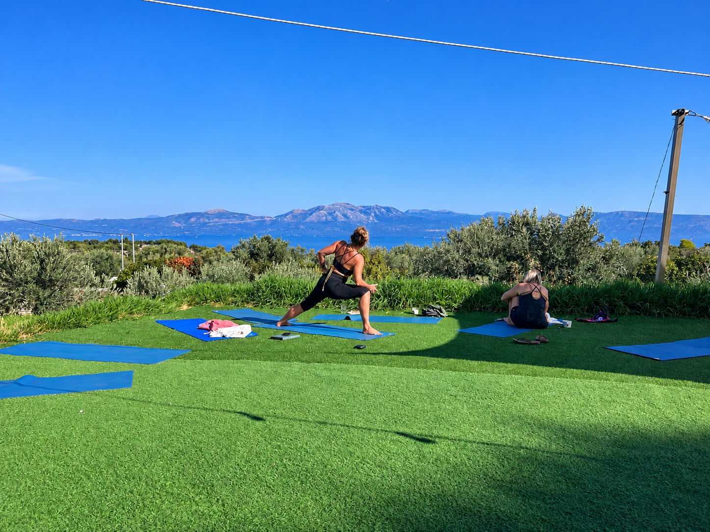 Yoga by the Mountain Sea.png