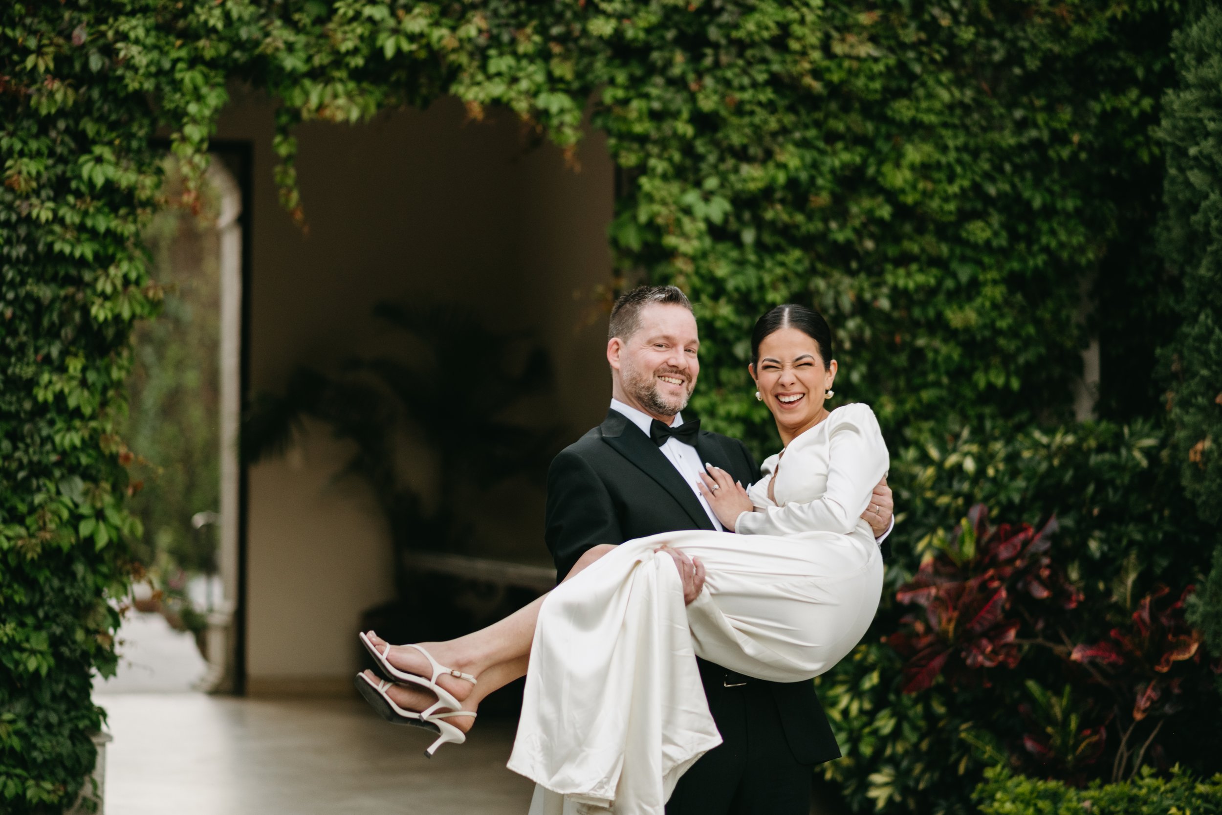 Couple wedding entrance at Pensativo House Hotel in Antigua, Guatemala. Destination wedding photography capturing authentic and romantic moments.
