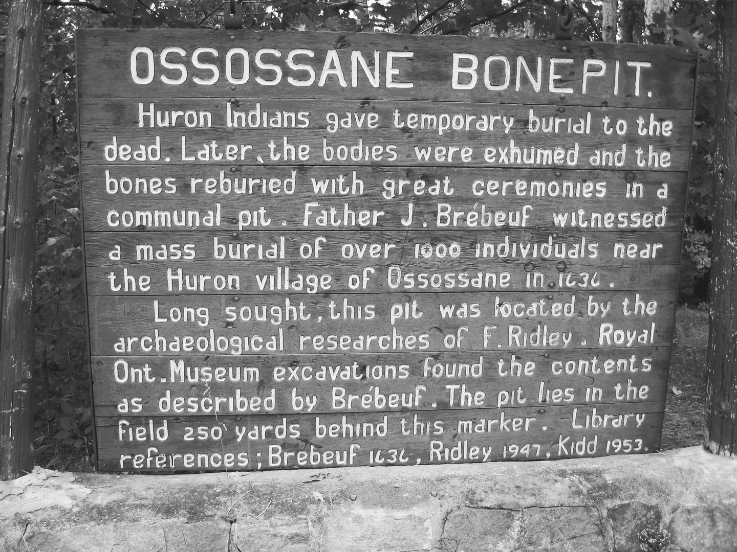 This sign once marked one of the most important archaeological sites in Ontario: the Ossossan&eacute; Ossuary, near Penetanguishene.

In 1636, Jesuit missionary Jean de Br&eacute;beuf reportedly witnessed a Wendat (Huron) mass reburial here, later kn