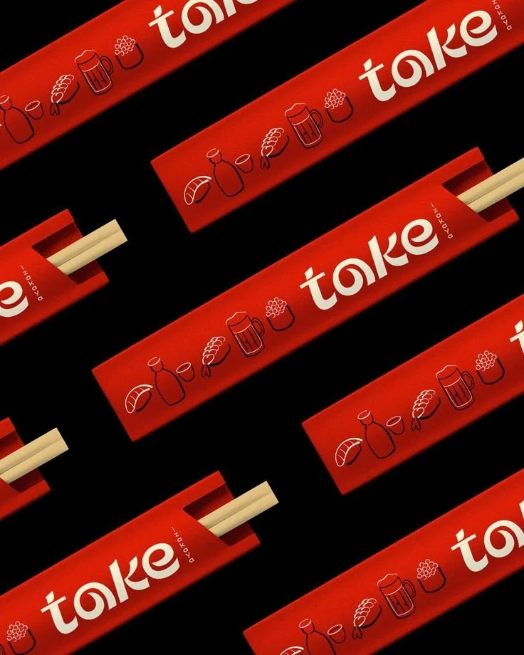 Multiple red takeout containers with white Japanese characters and illustrations of food items like a bottle, a beer mug, and a bowl of food on a black background.