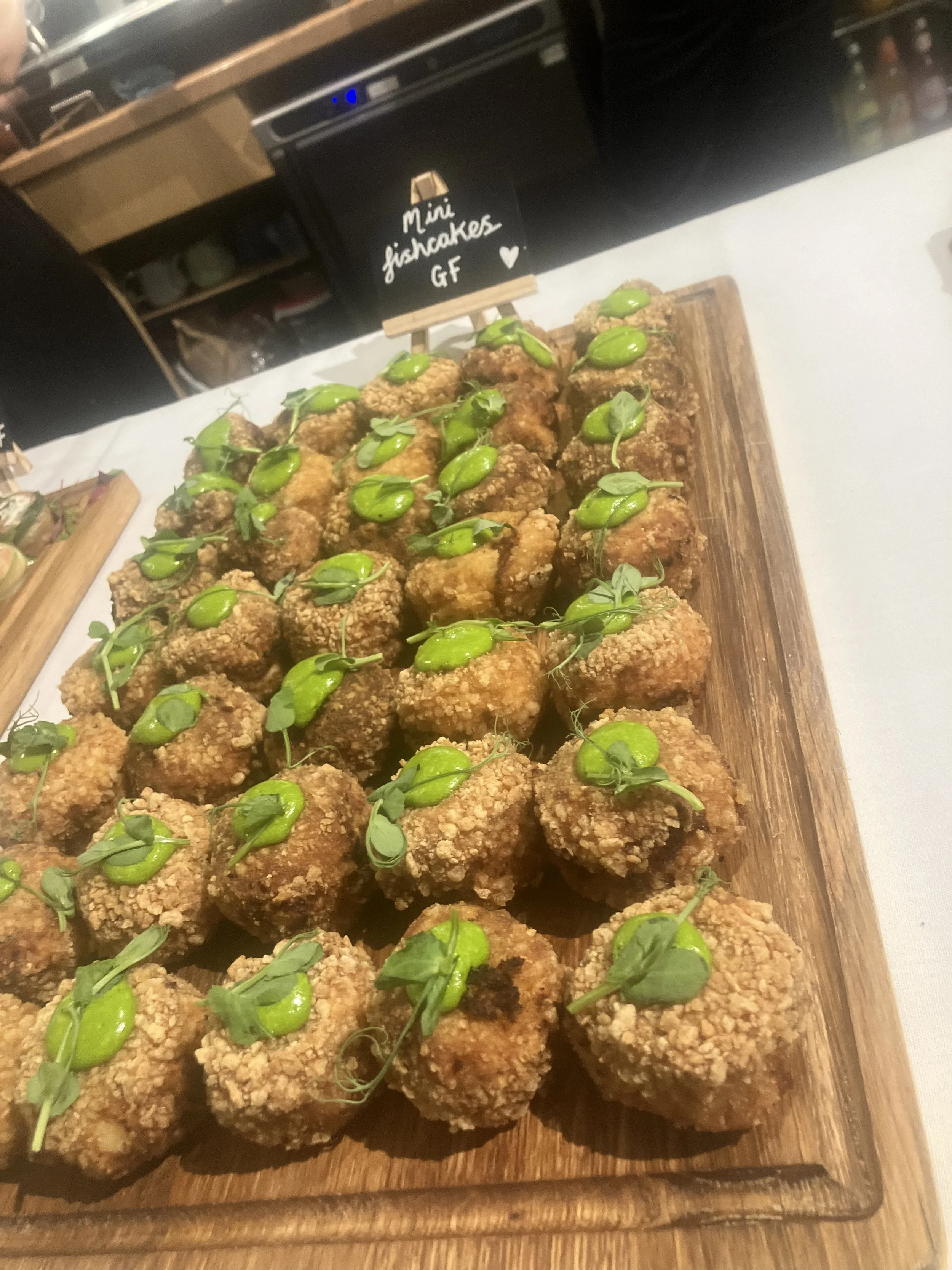 Mini Fishcake canape with lovage emulsion 